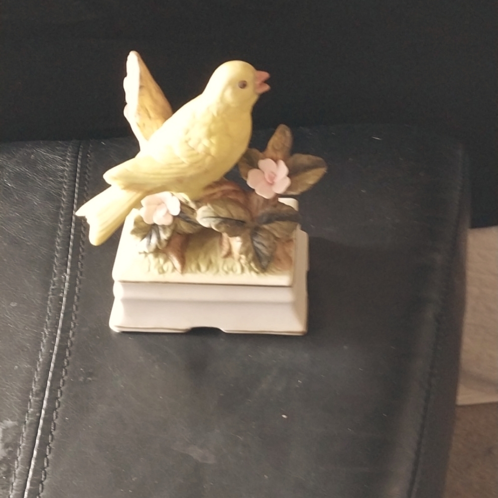 Yellow bird musical figurine
